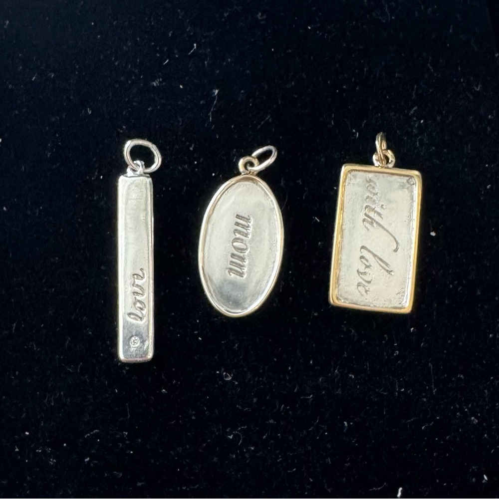 “Mom” Stella & Dot Silver “Mom” Charm with gold edge. .925 silver